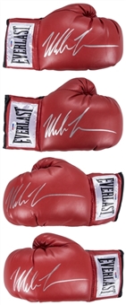 Lot of (4) Mike Tyson Signed Red Everlast Boxing Gloves - 2 Left Hand, 2 Right Hand (PSA/DNA)